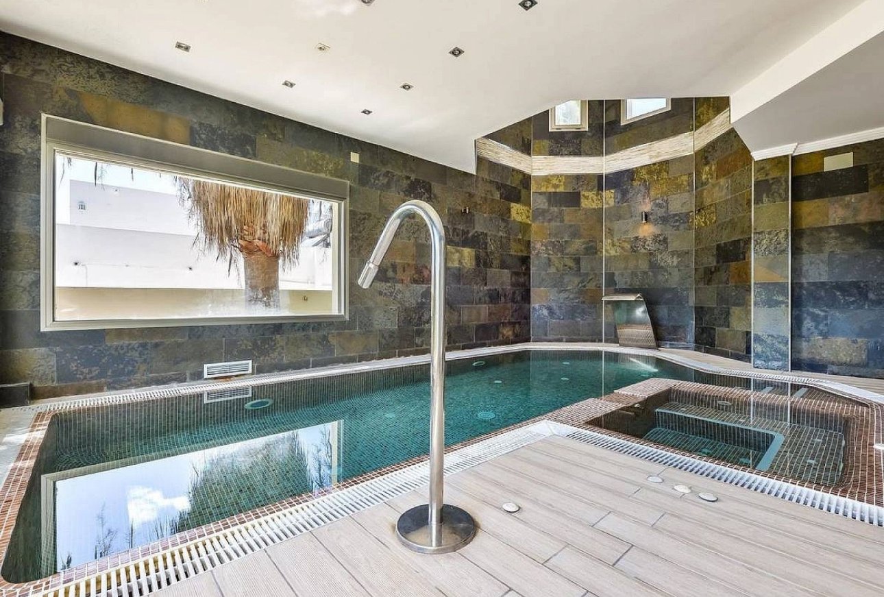 Indoor spa with heated pool and jacuzzi