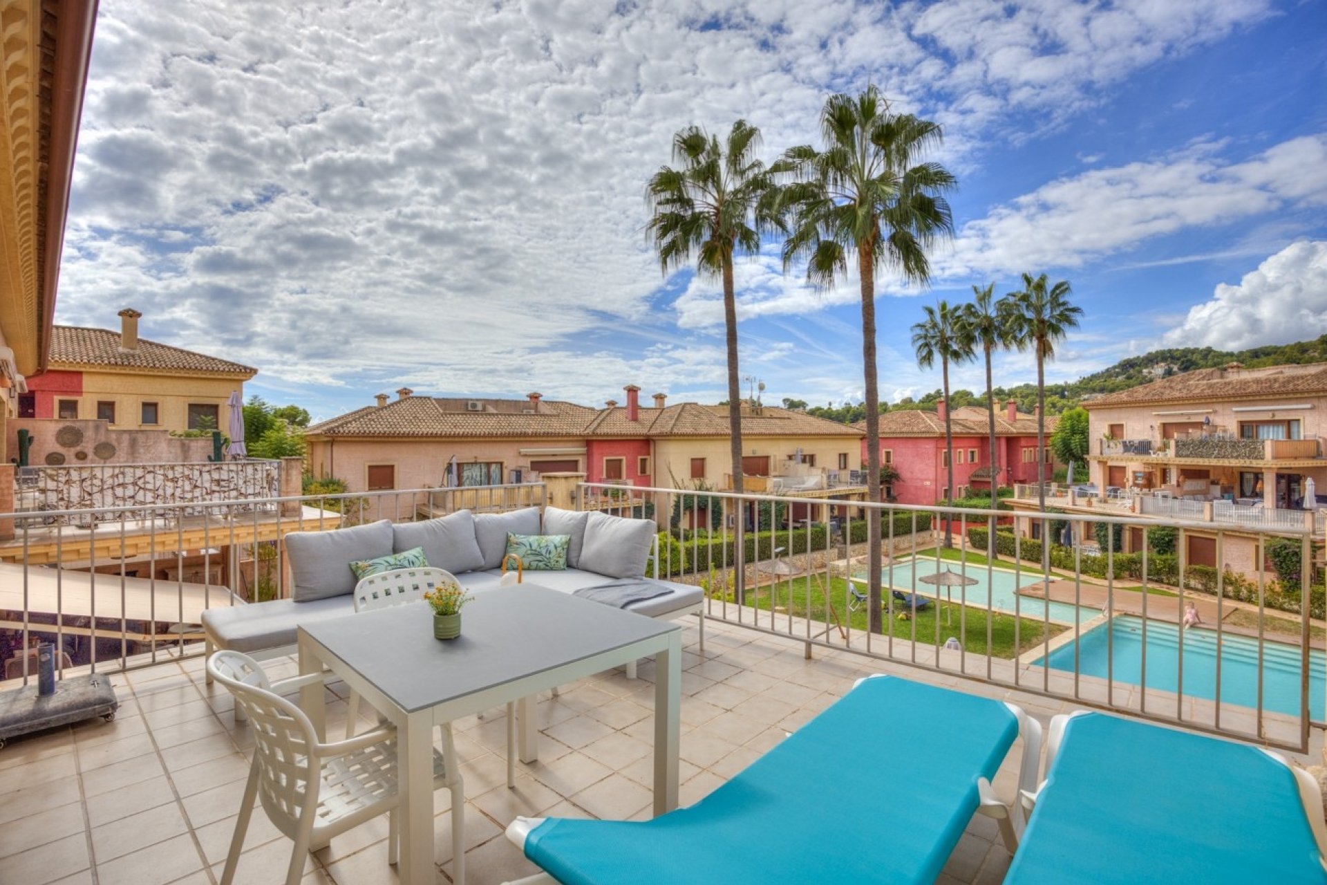 Private, southwest-facing balcony overlooking the communal gardens