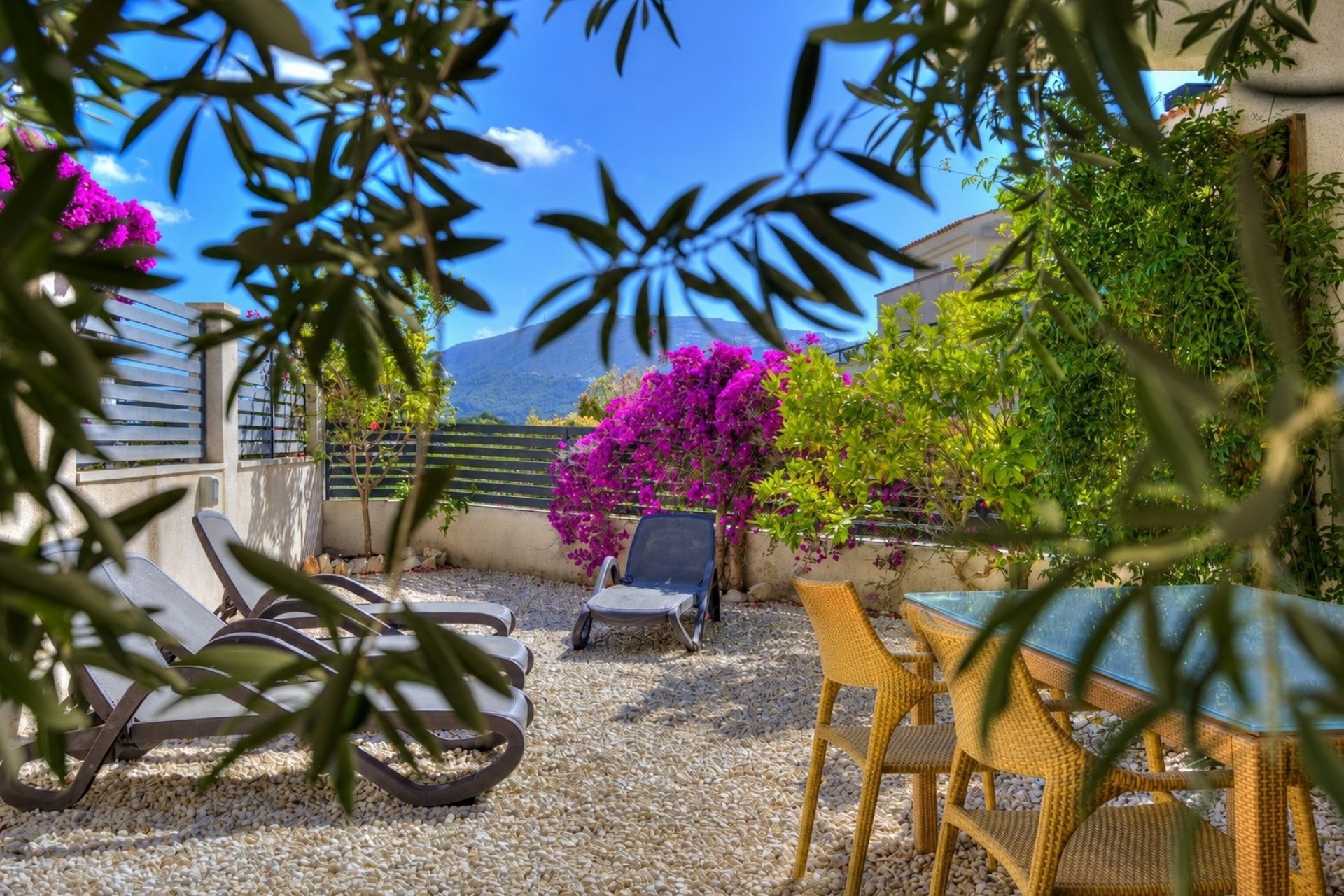 Sunny private gardens of Moraira Sport property in Sabatera, Moraira